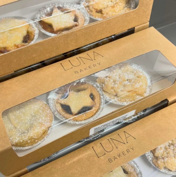 Our boxes of star-topped mince pies, dusted with icing sugar
